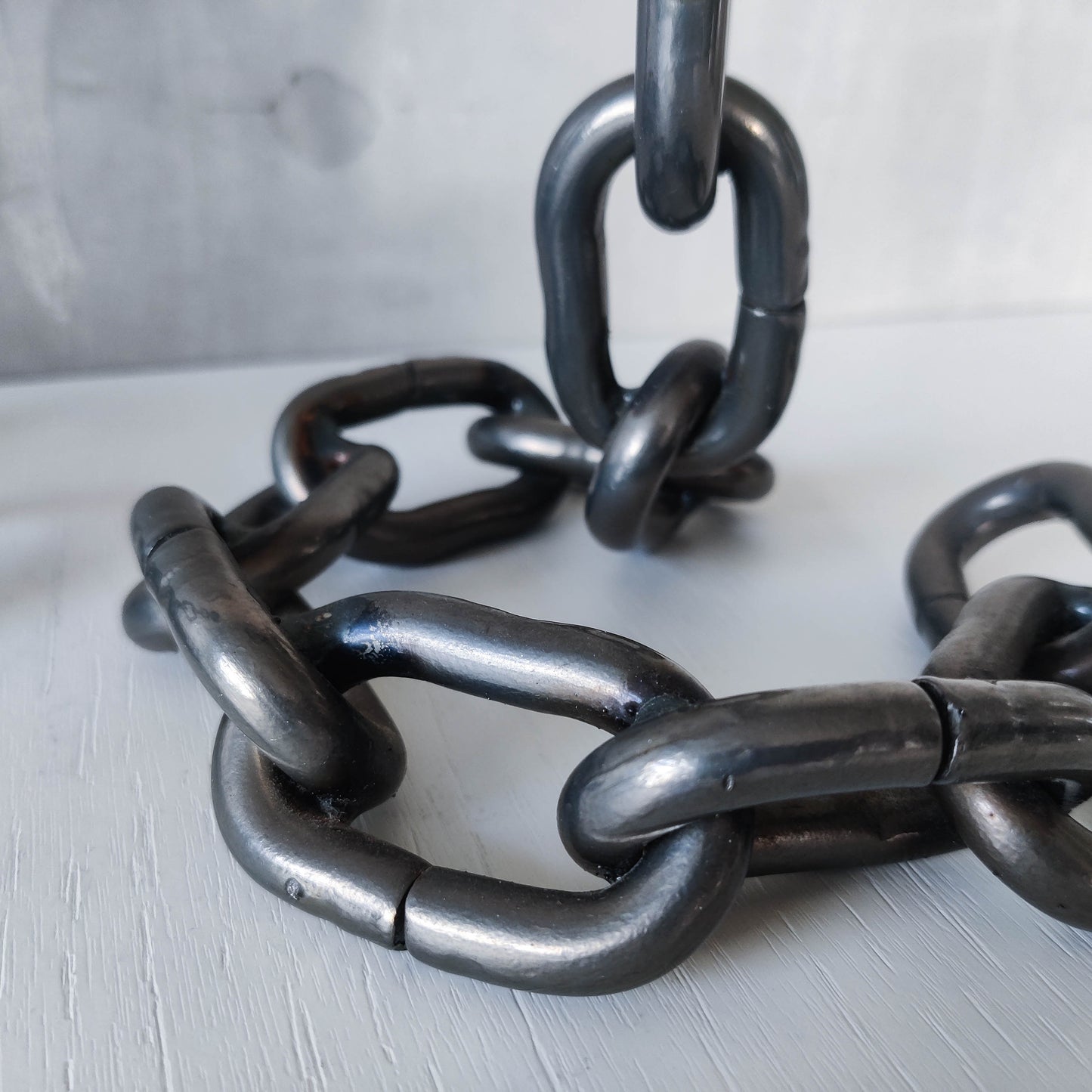 Pair of brutalist heavy hand welded steel chain link sculptural candle holders