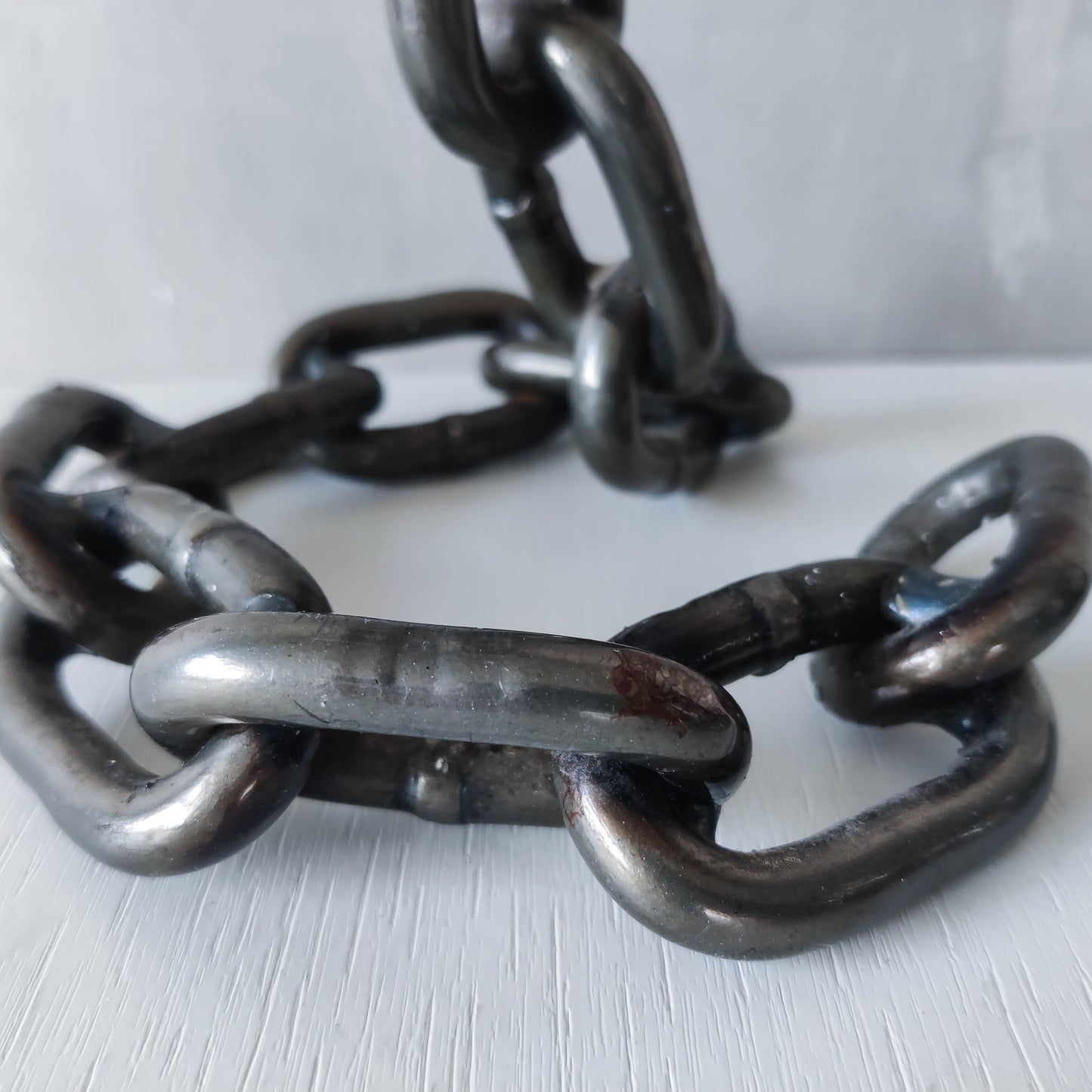 Pair of brutalist heavy hand welded steel chain link sculptural candle holders