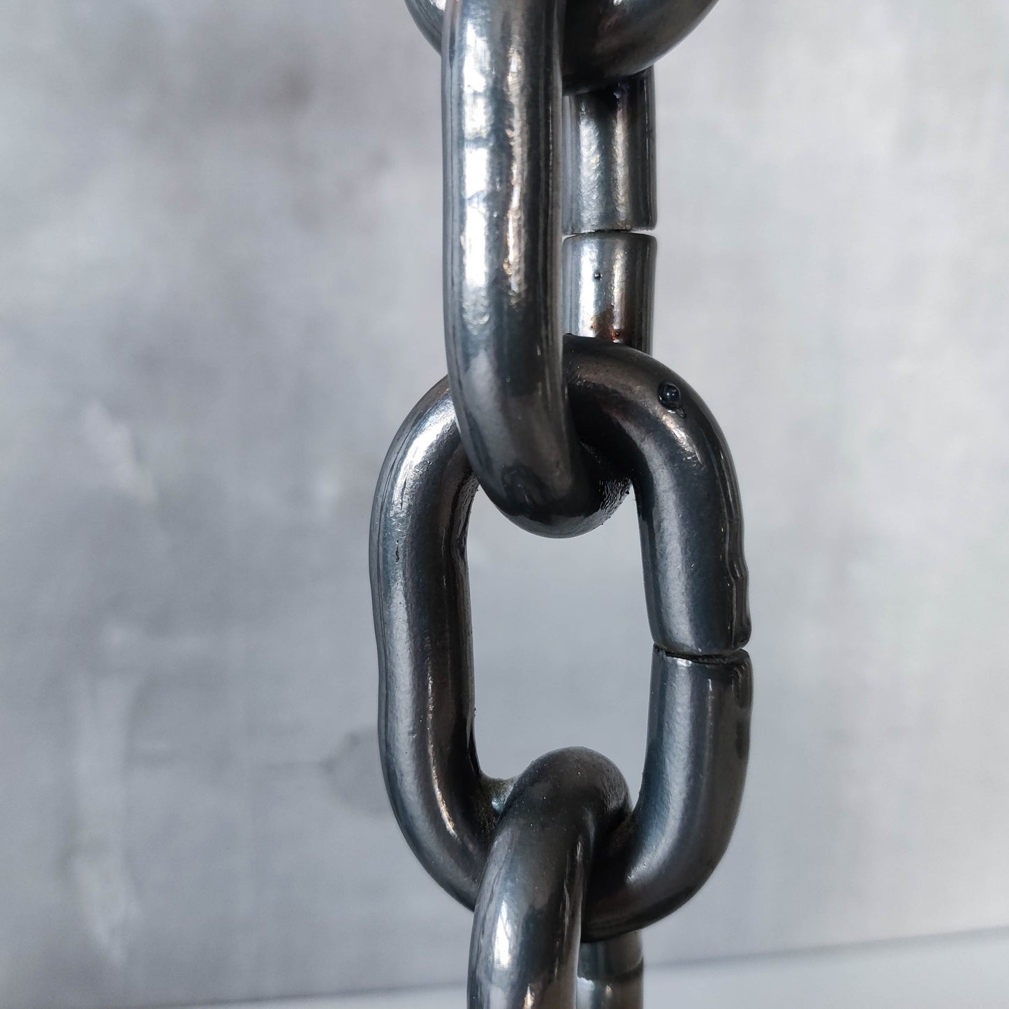 Pair of brutalist heavy hand welded steel chain link sculptural candle holders