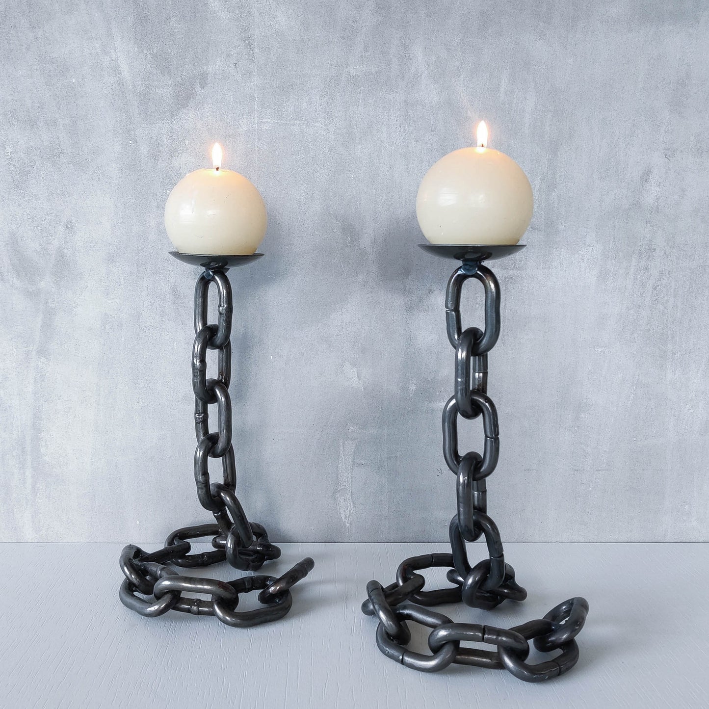 Pair of brutalist heavy hand welded steel chain link sculptural candle holders