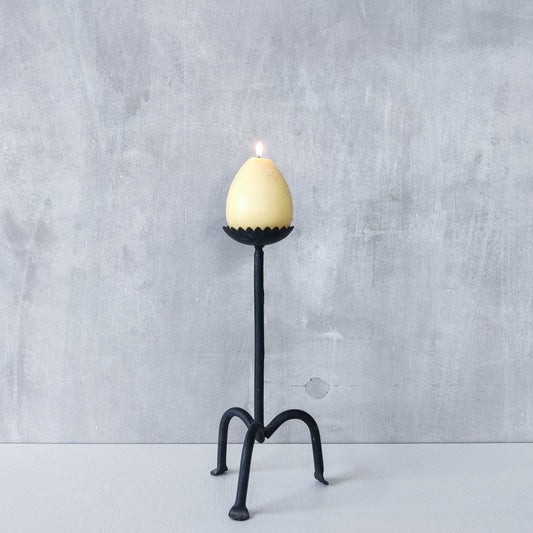 Hand forged black iron sculptural candle holder with scalloped edge tripod feet