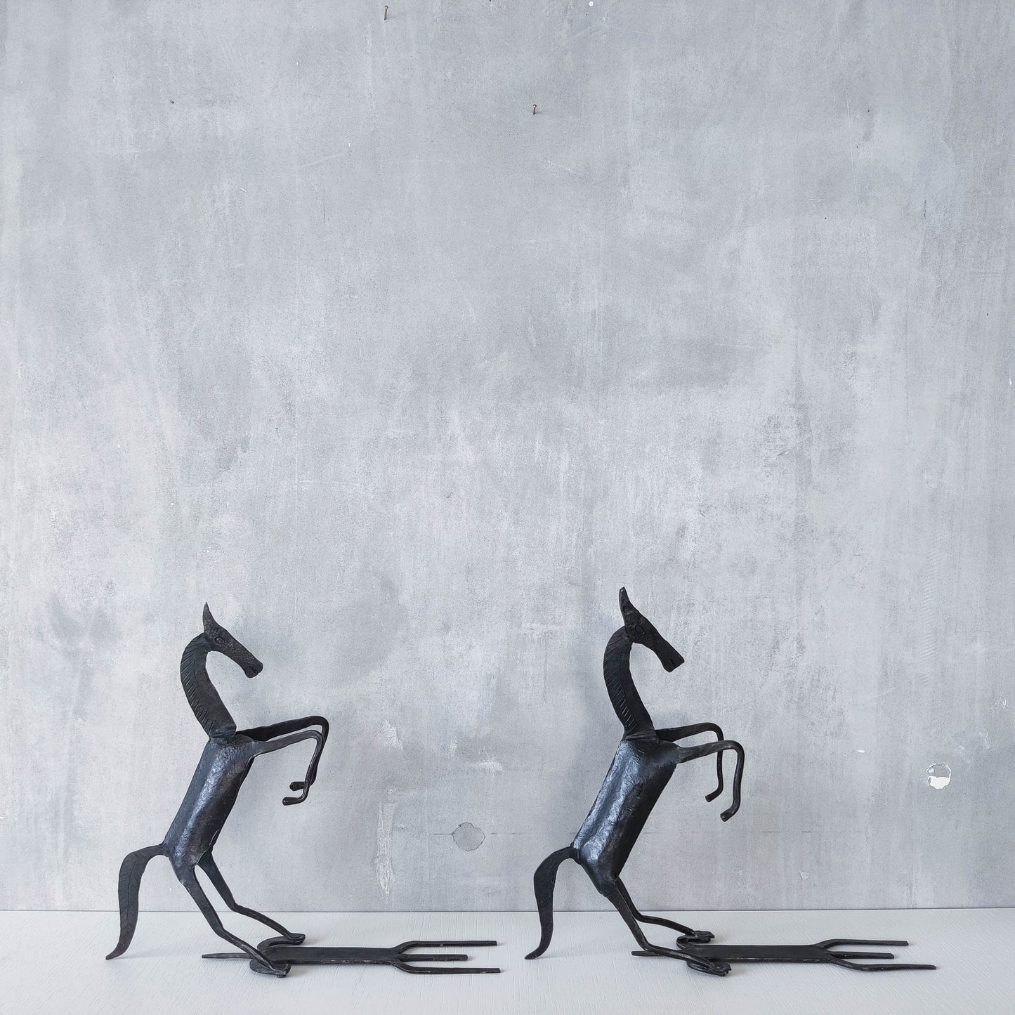 Vintage brutalist pair of hand forged patinated steel horses bookends sculptures