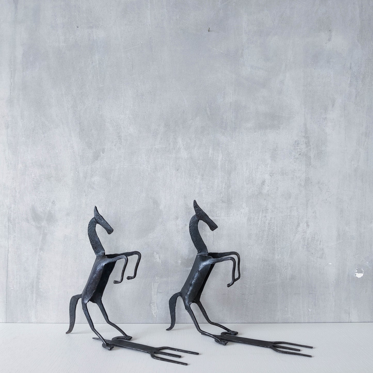 Vintage brutalist pair of hand forged patinated steel horses bookends sculptures