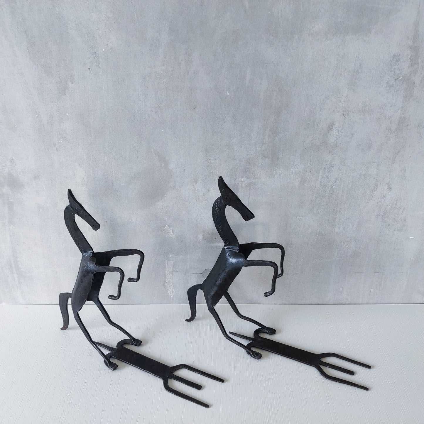 Vintage brutalist pair of hand forged patinated steel horses bookends sculptures