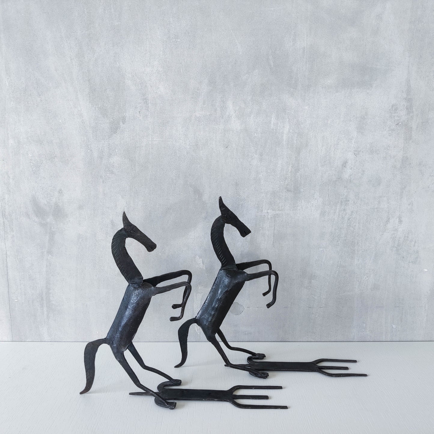 Vintage brutalist pair of hand forged patinated steel horses bookends sculptures