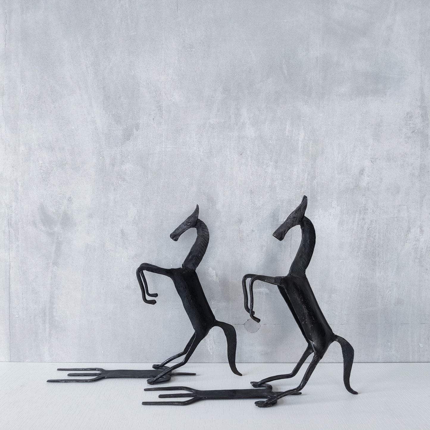 Vintage brutalist pair of hand forged patinated steel horses bookends sculptures