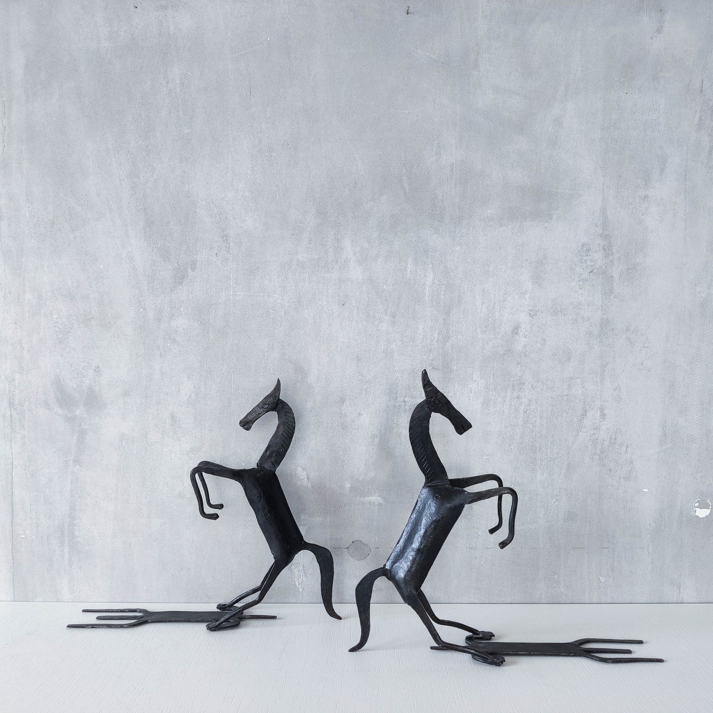 Vintage brutalist pair of hand forged patinated steel horses bookends sculptures