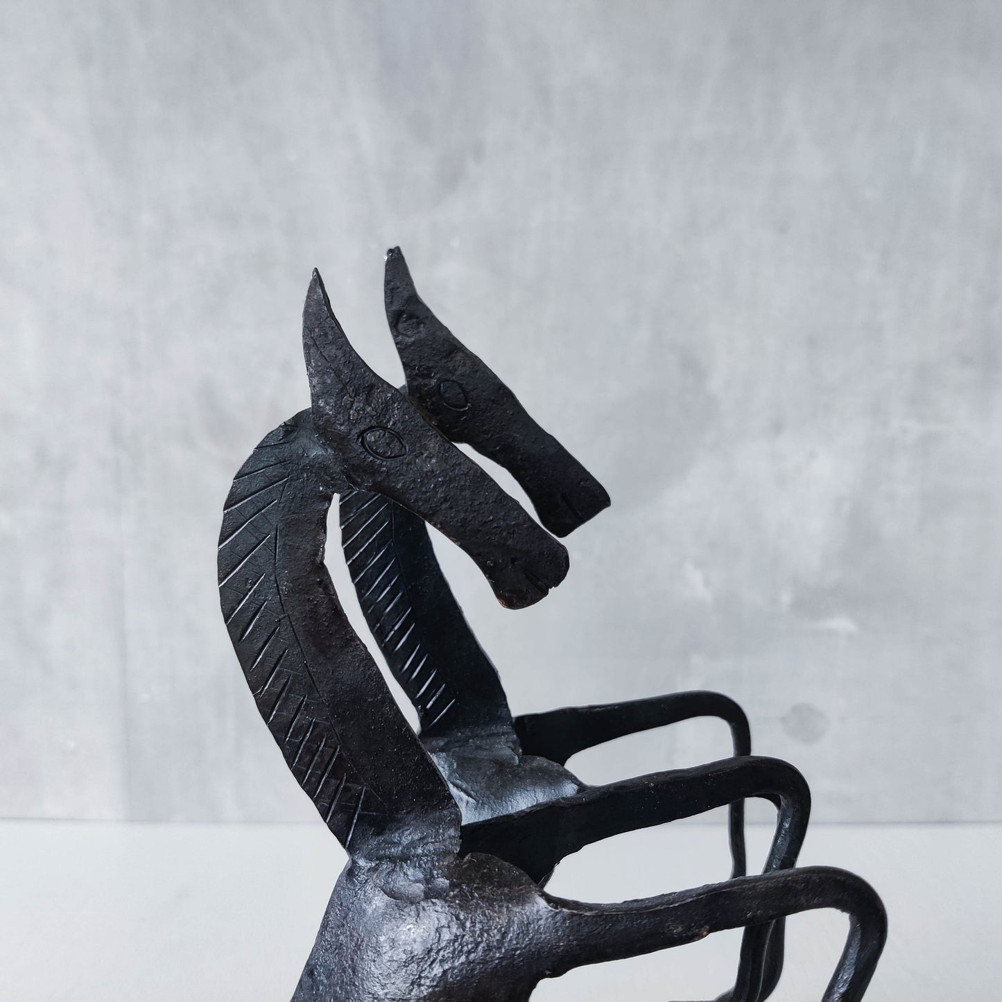 Vintage brutalist pair of hand forged patinated steel horses bookends sculptures