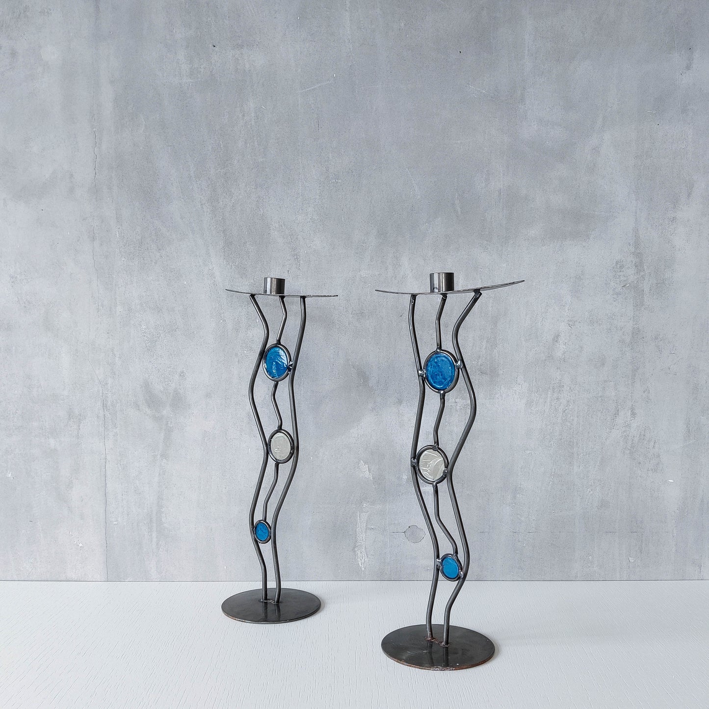 Pair of vintage hand forged steel cast glass postmodern style wavy candle holders