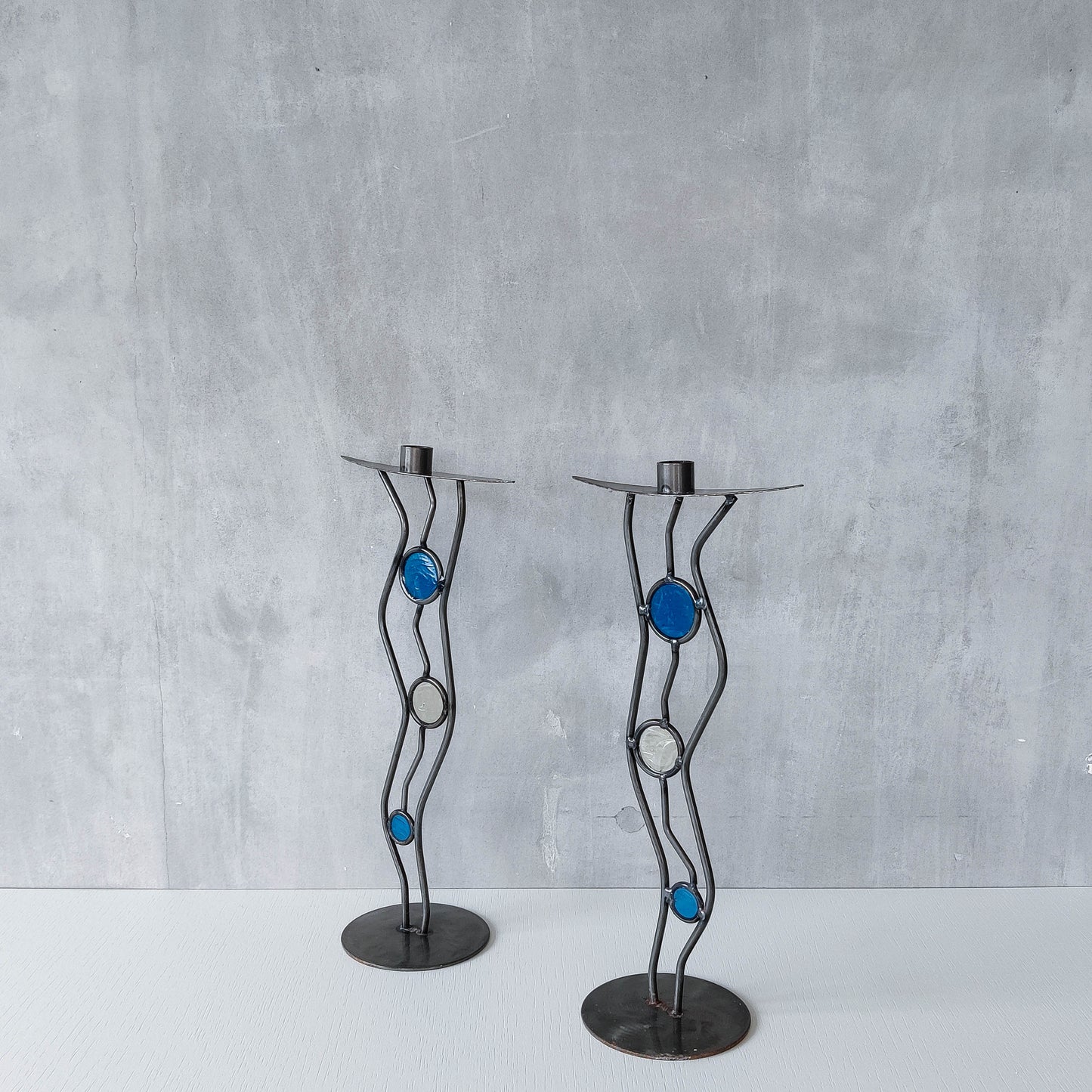 Pair of vintage hand forged steel cast glass postmodern style wavy candle holders