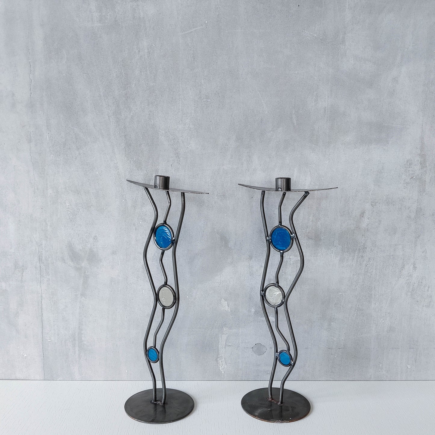 Pair of vintage hand forged steel cast glass postmodern style wavy candle holders