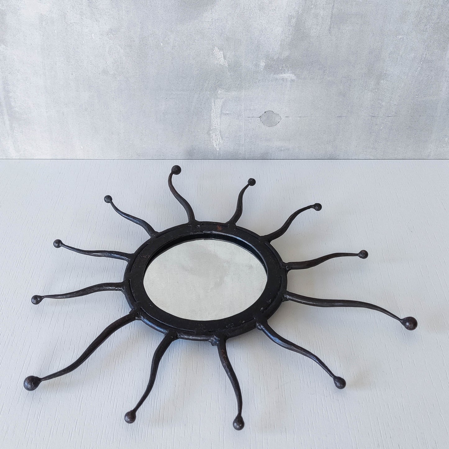 Vintage 1990s hand made artisan metal work wrought iron sun burst mirror