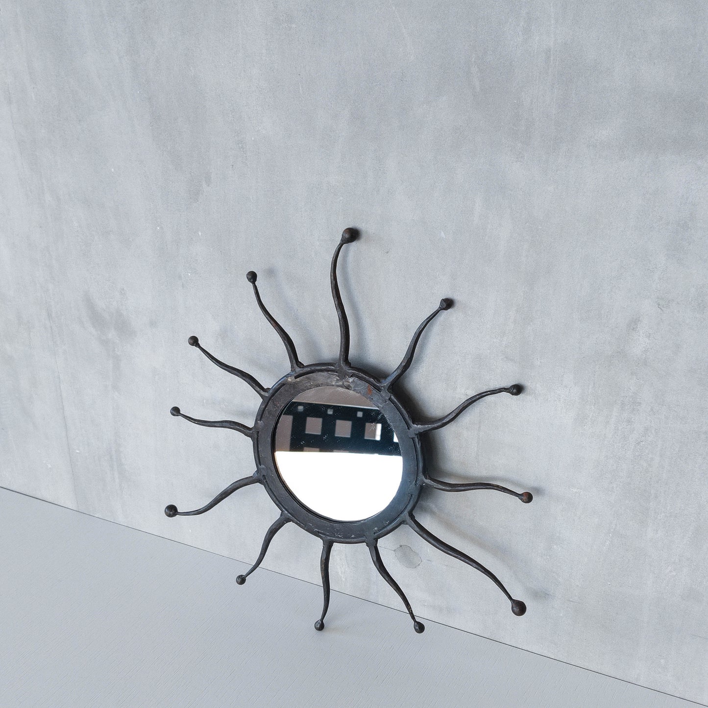 Vintage 1990s hand made artisan metal work wrought iron sun burst mirror