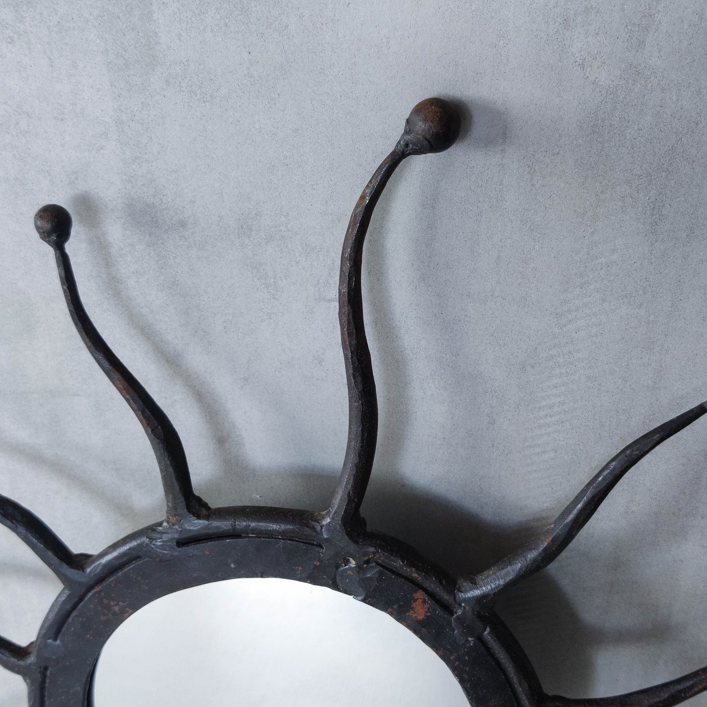 Vintage 1990s hand made artisan metal work wrought iron sun burst mirror
