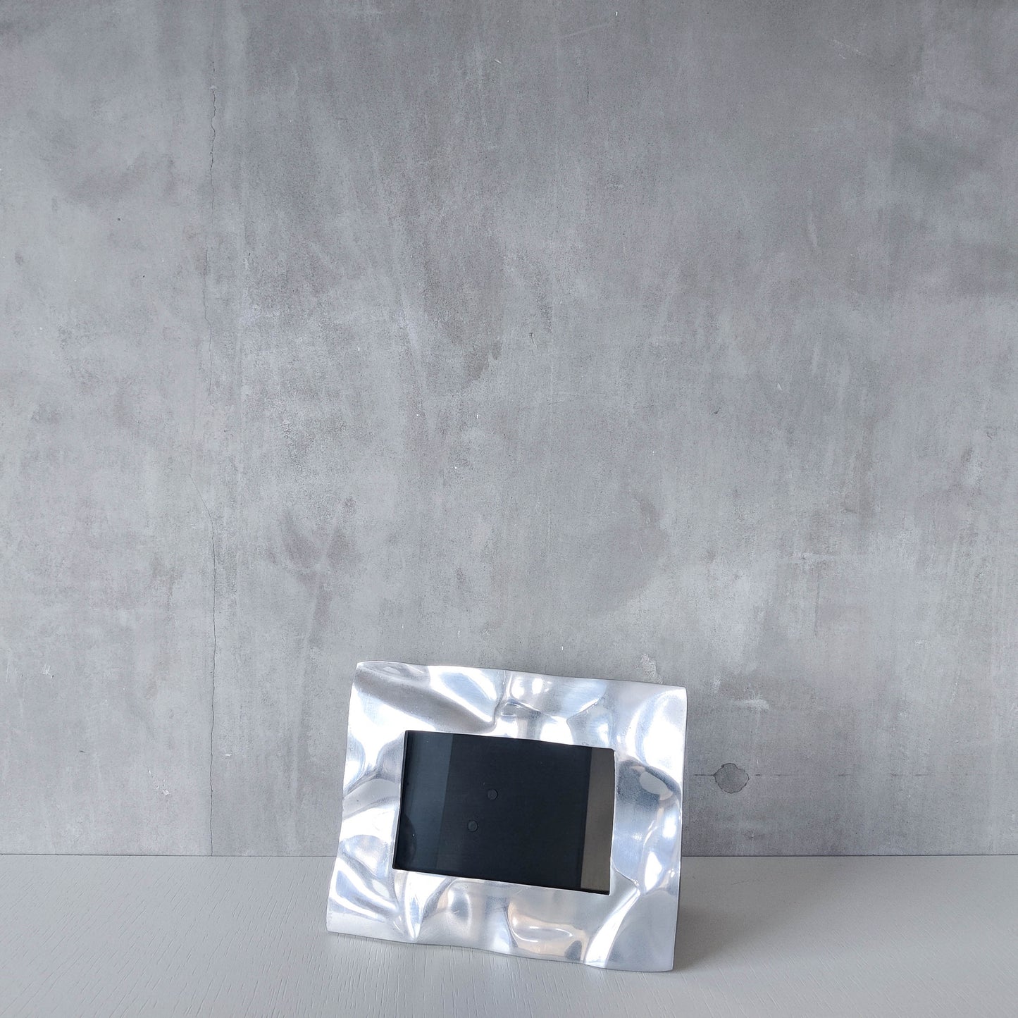 Vintage 1990s chunky cast aluminium crumpled trompe l'oeil photo frame