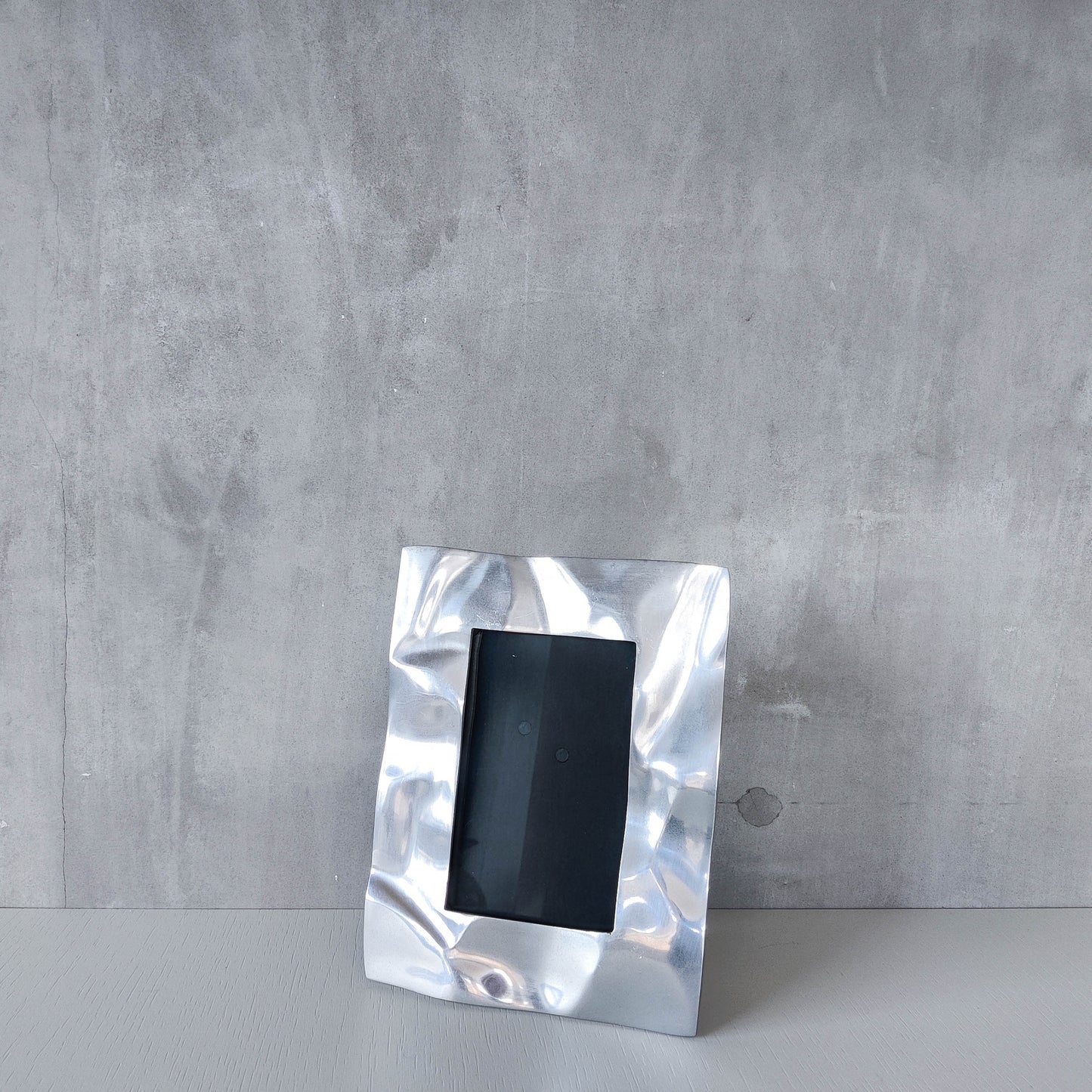 Vintage 1990s chunky cast aluminium crumpled trompe l'oeil photo frame