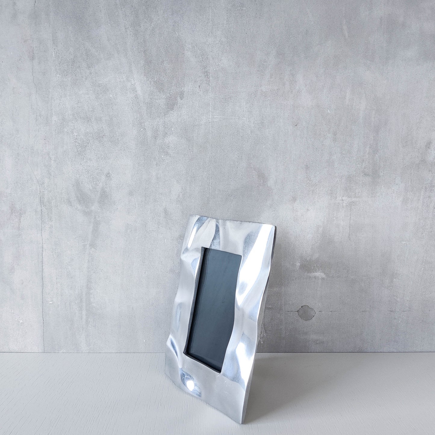 Vintage 1990s chunky cast aluminium crumpled trompe l'oeil photo frame