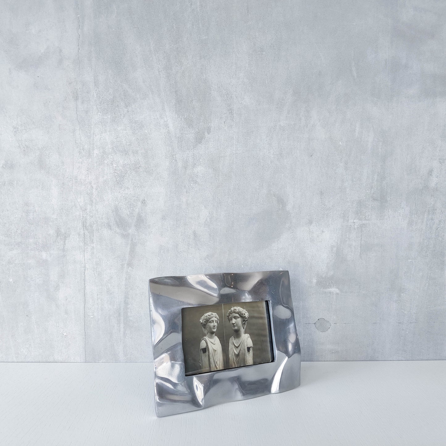 Vintage 1990s chunky cast aluminium crumpled trompe l'oeil photo frame