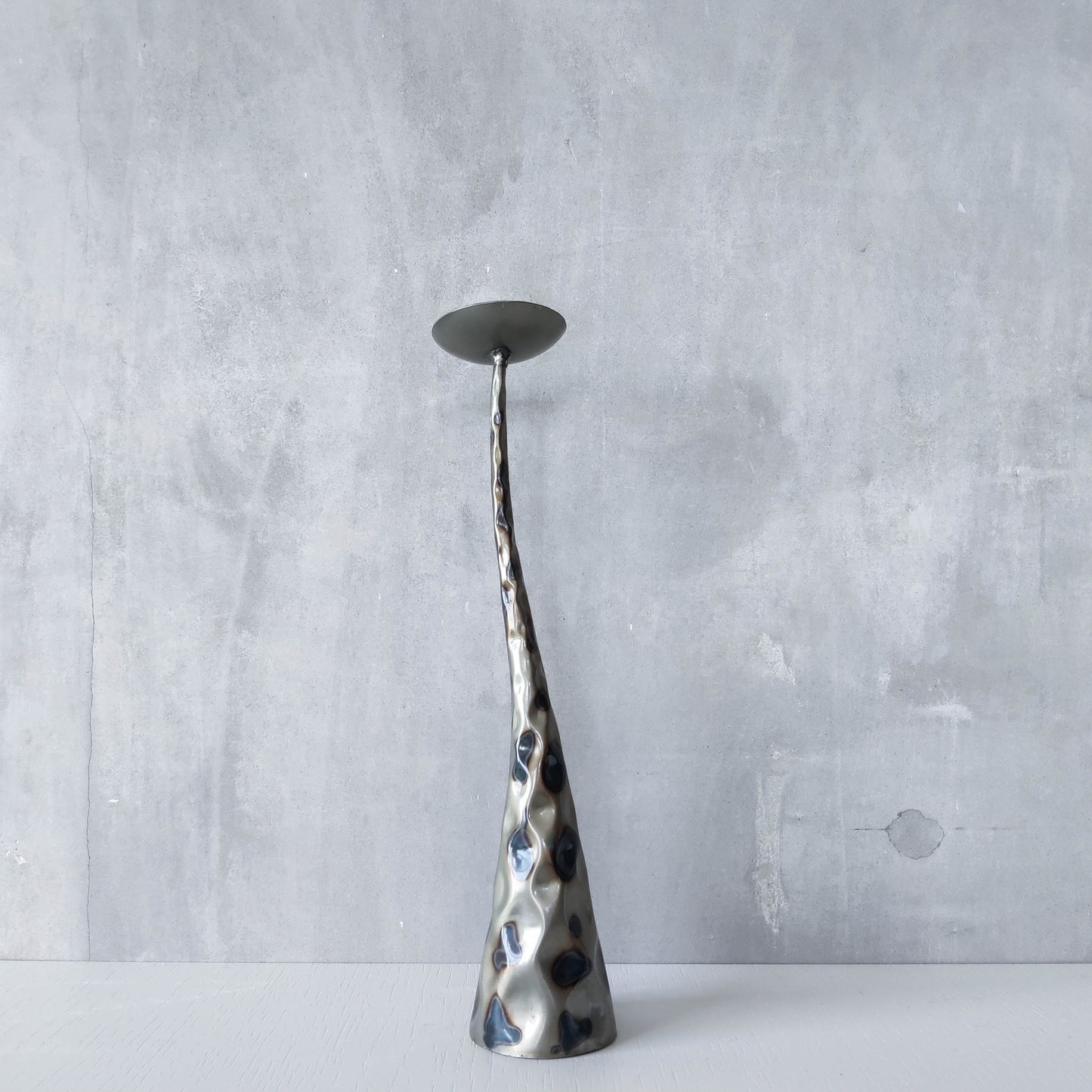 Vintage brutalist style torched sculptural steel candle holder with pricket top