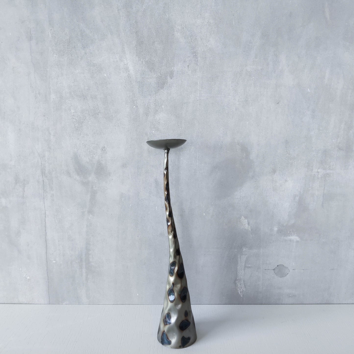 Vintage brutalist style torched sculptural steel candle holder with pricket top