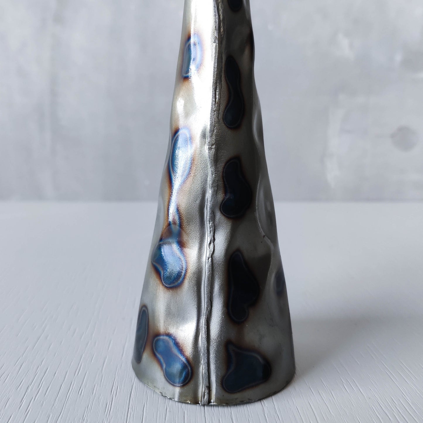 Vintage brutalist style torched sculptural steel candle holder with pricket top