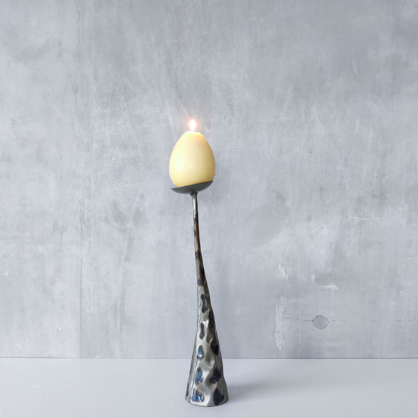 Vintage brutalist style torched sculptural steel candle holder with pricket top