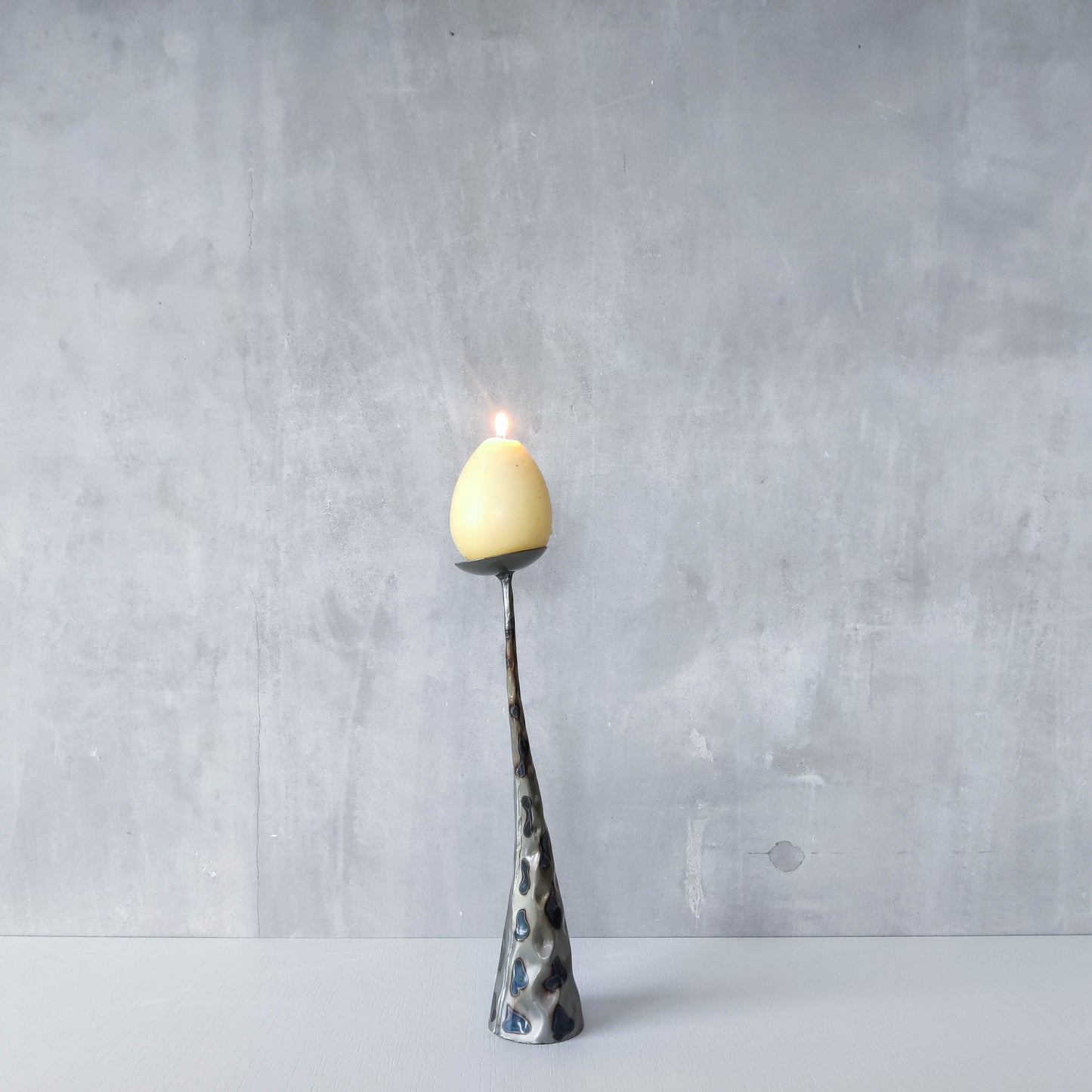 Vintage brutalist style torched sculptural steel candle holder with pricket top