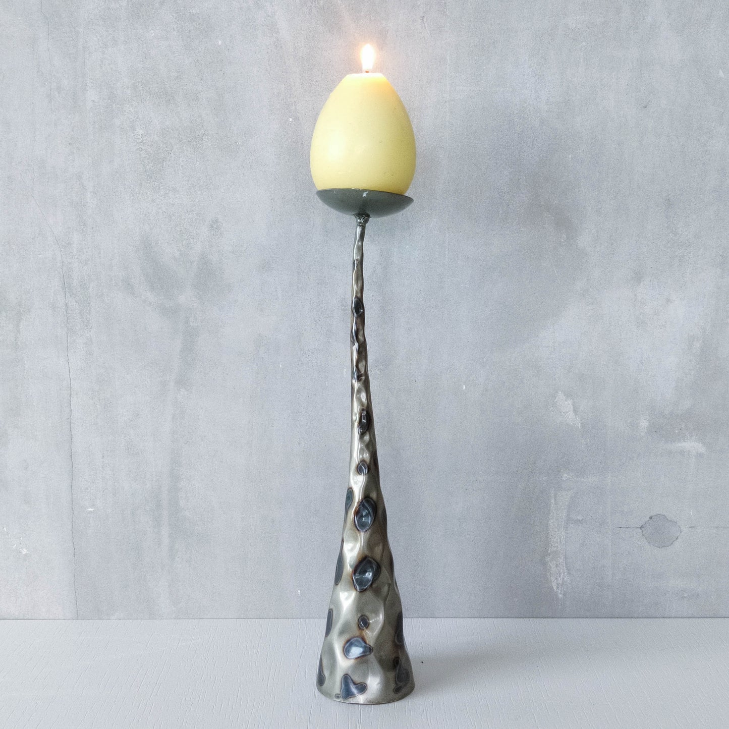 Vintage brutalist style torched sculptural steel candle holder with pricket top