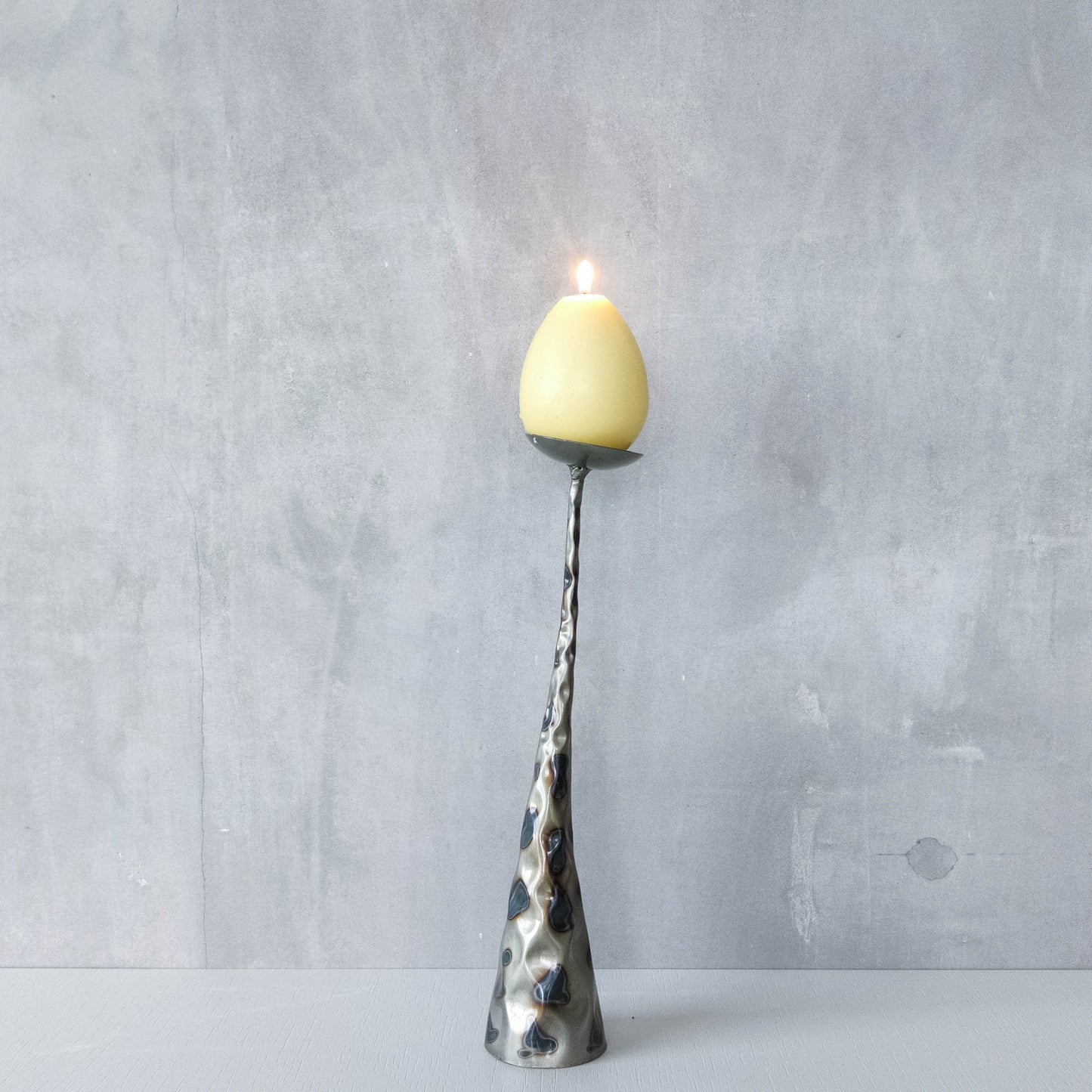 Vintage brutalist style torched sculptural steel candle holder with pricket top