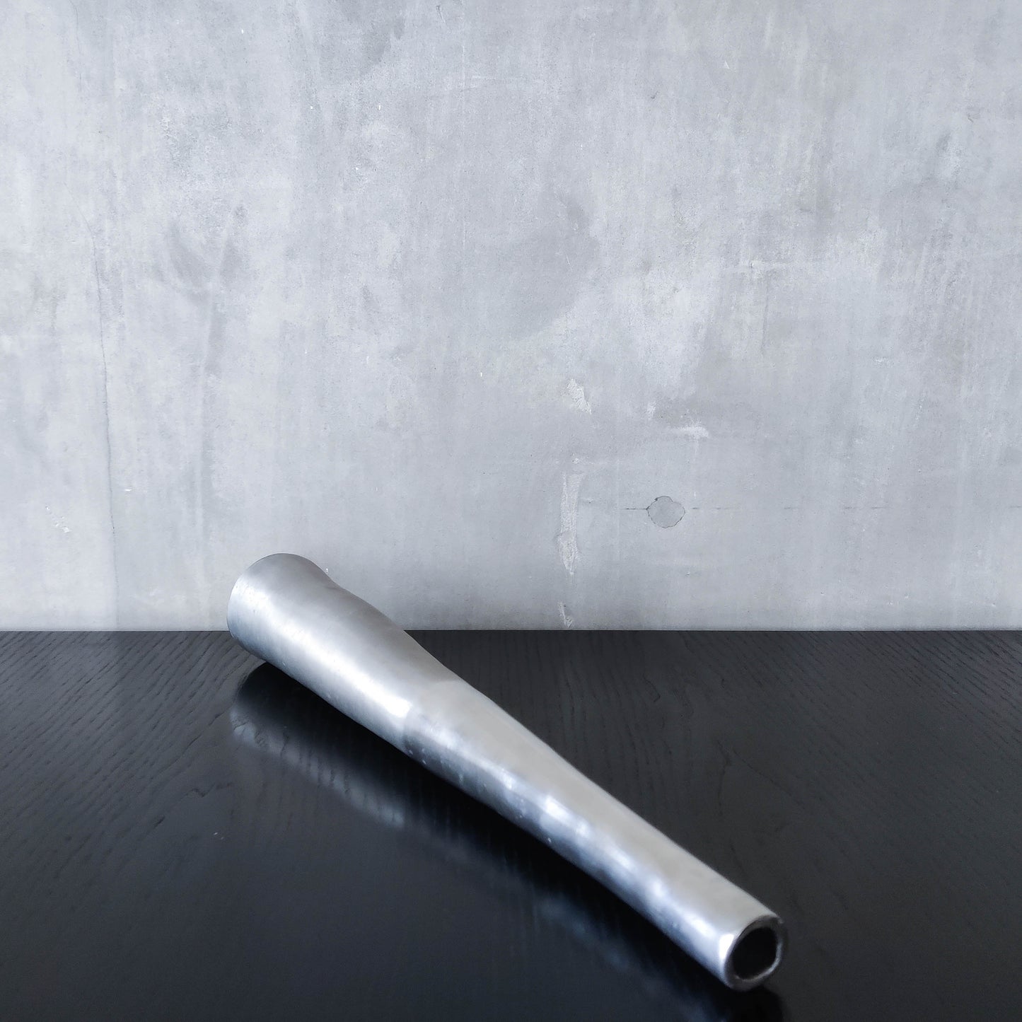 Vintage 1990s tapered slender cast aluminium sculptural bud vase