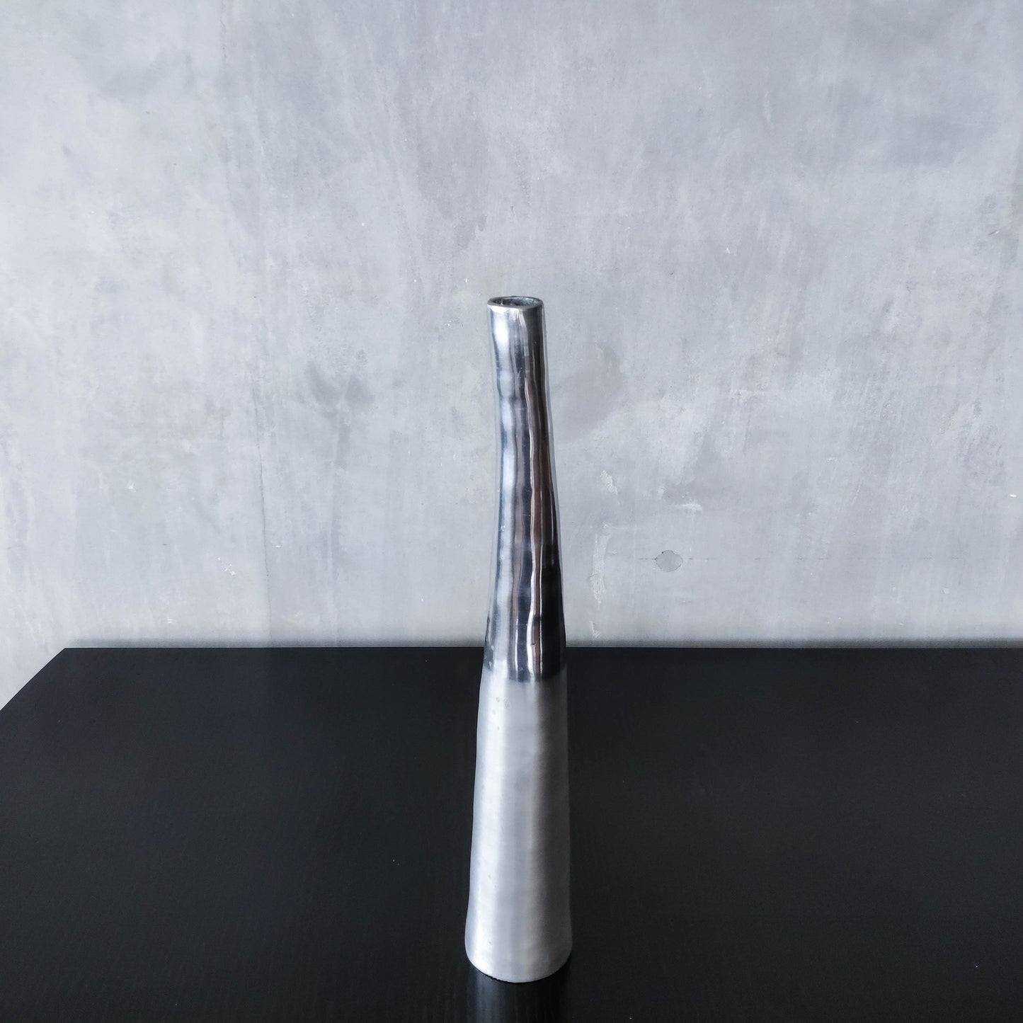 Vintage 1990s tapered slender cast aluminium sculptural bud vase