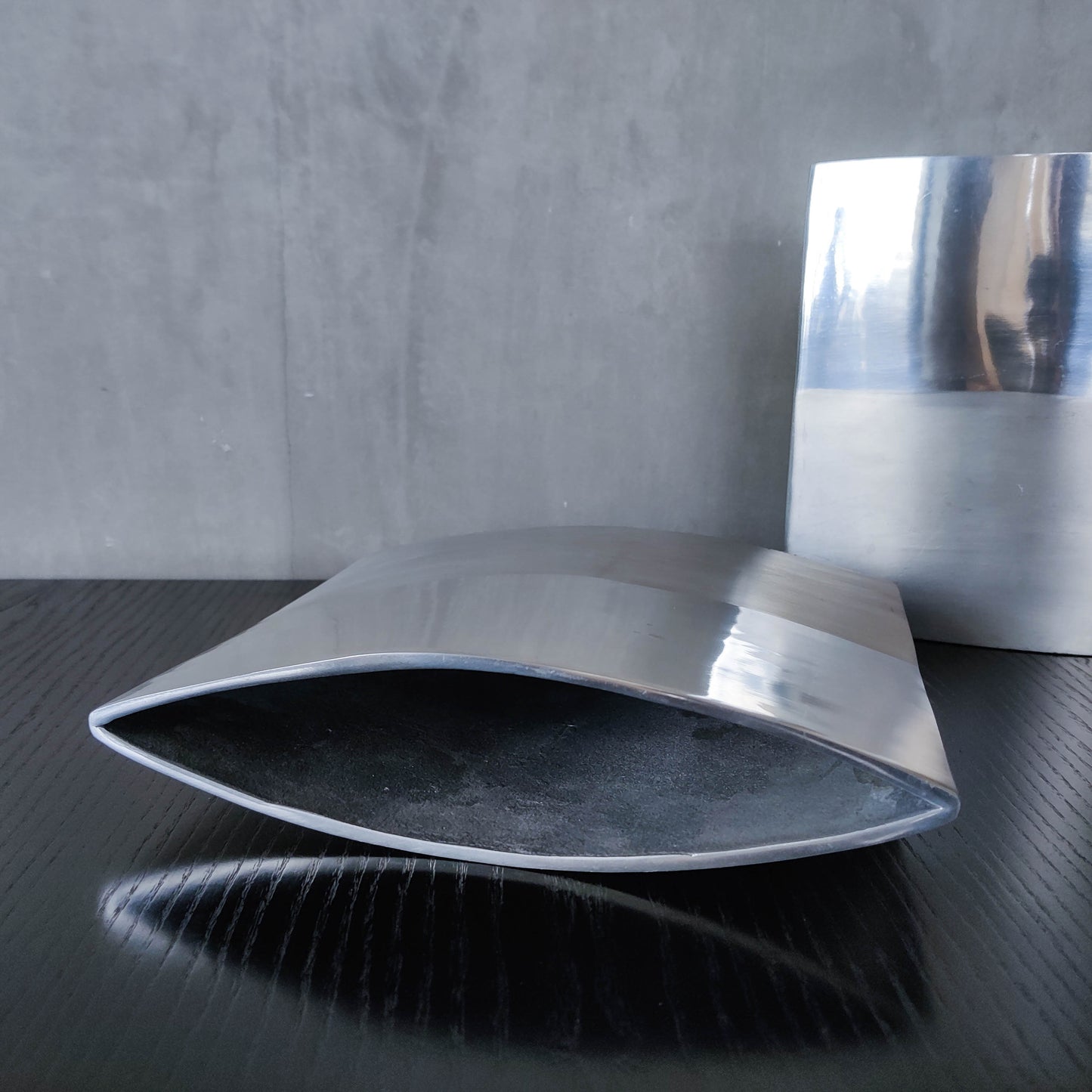 Pair of vintage 00s flat sculptural hand cast aluminium vases