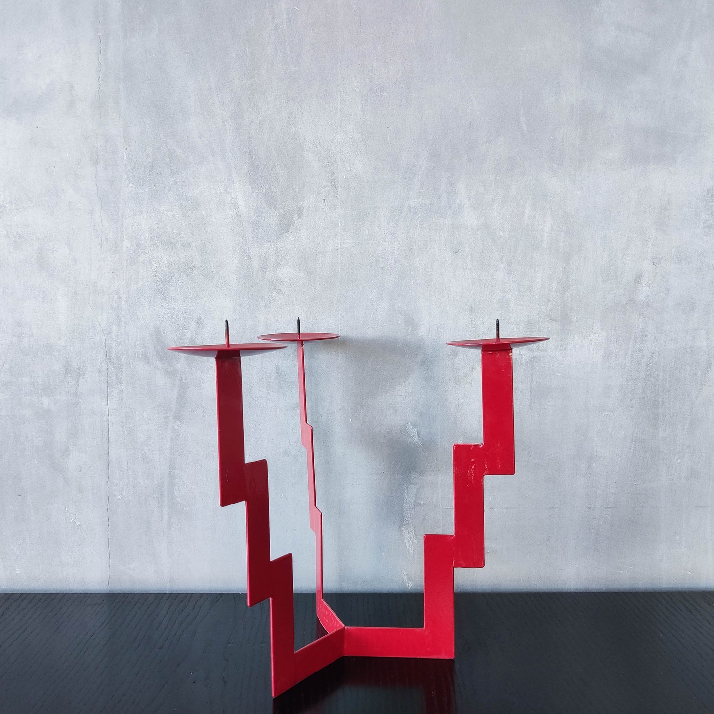 Vintage postmodern style large red steel zigzag candelabra