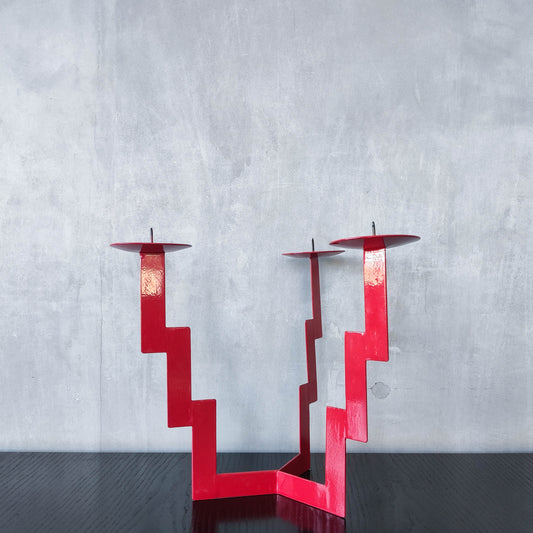 Vintage postmodern style large red steel zigzag candelabra