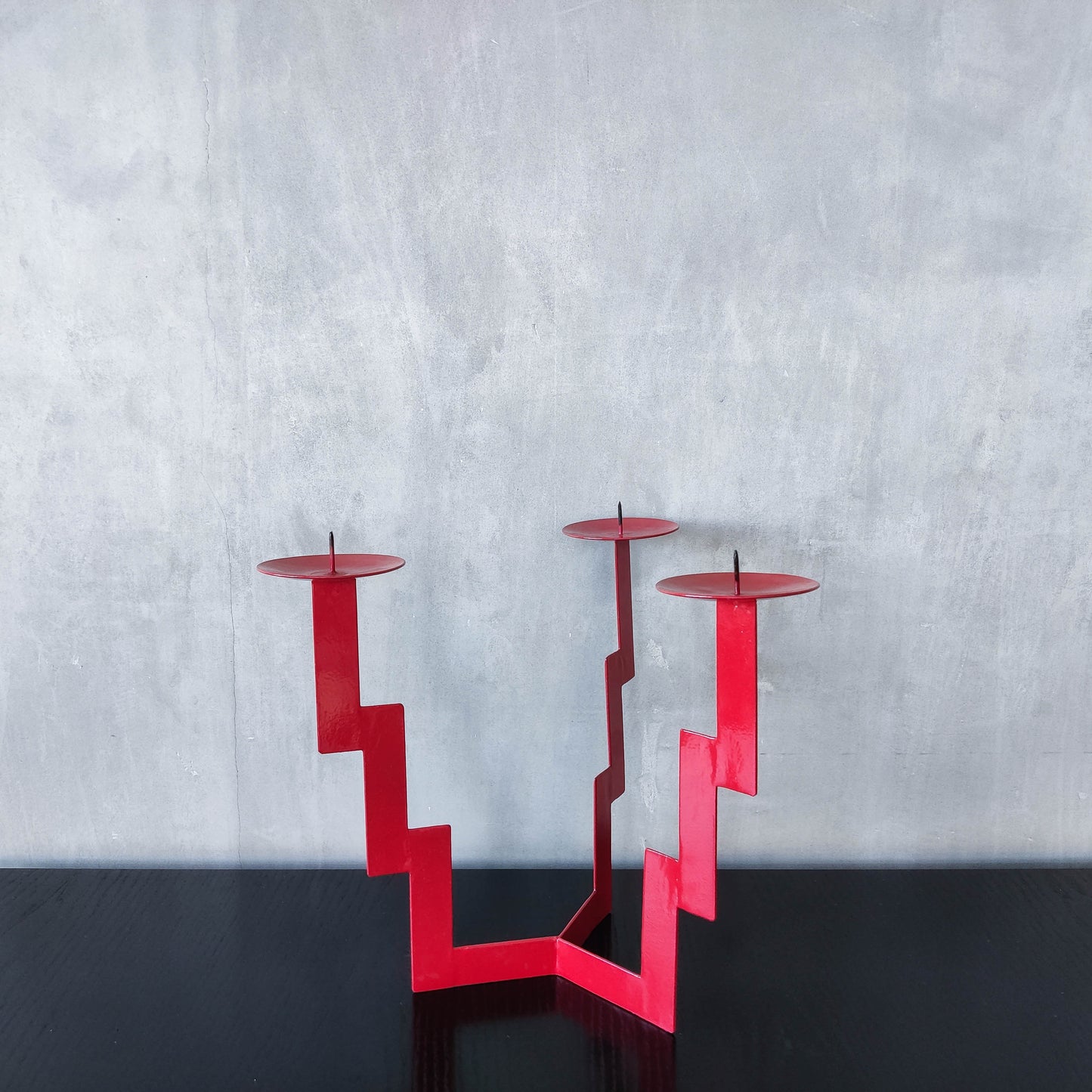 Vintage postmodern style large red steel zigzag candelabra