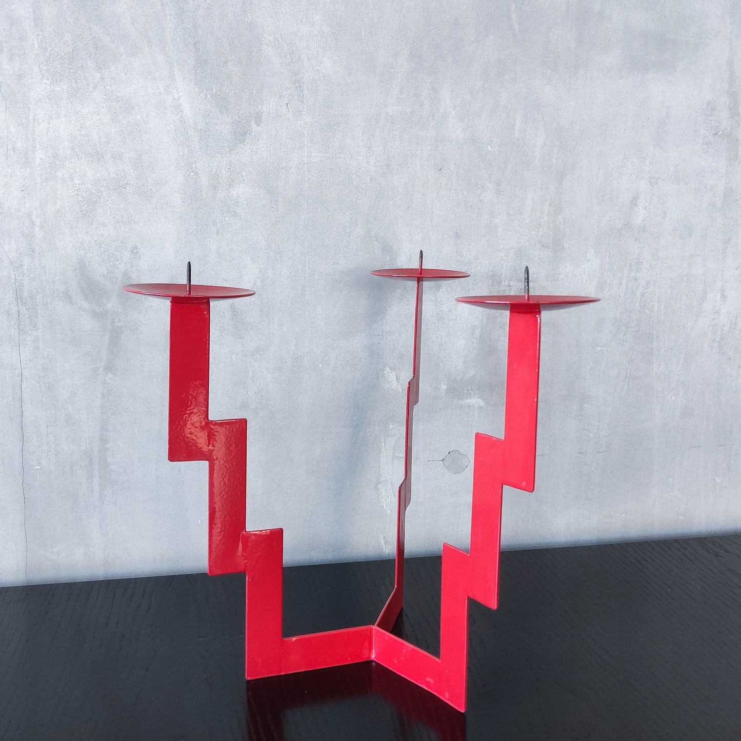 Vintage postmodern style large red steel zigzag candelabra