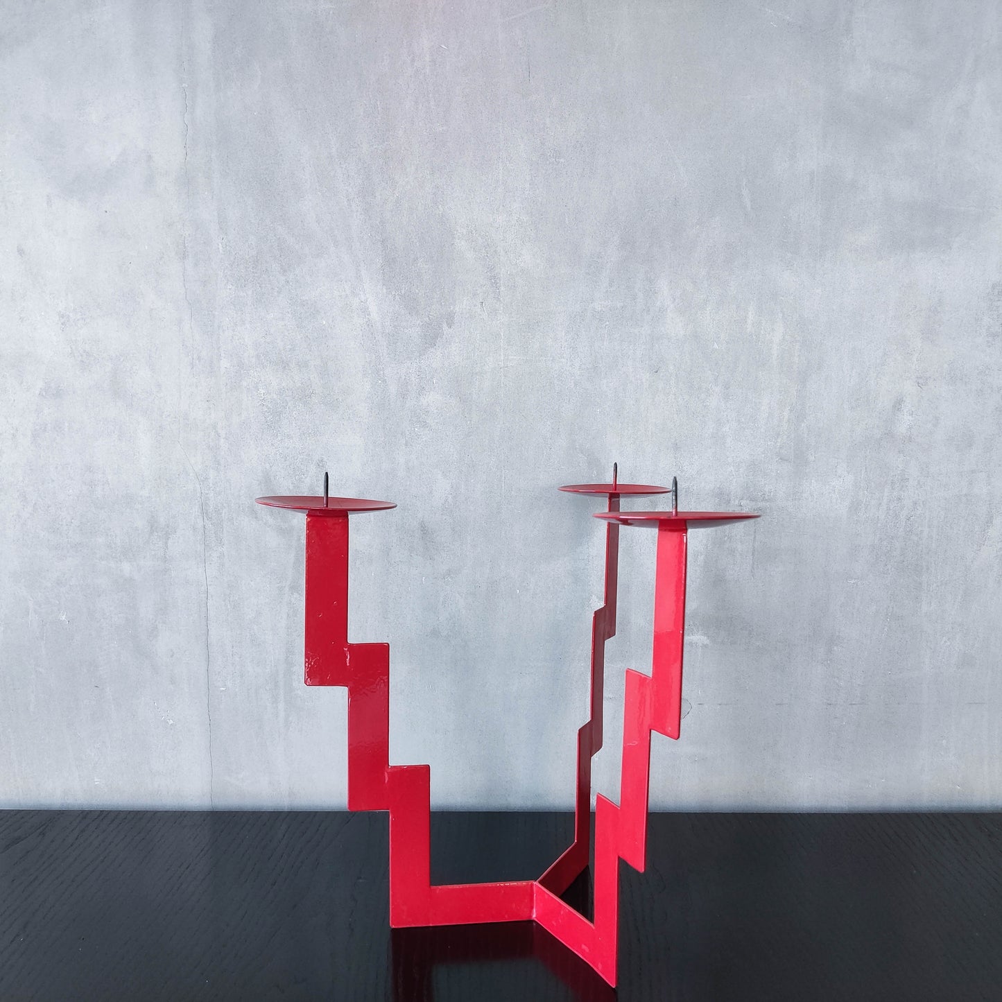 Vintage postmodern style large red steel zigzag candelabra