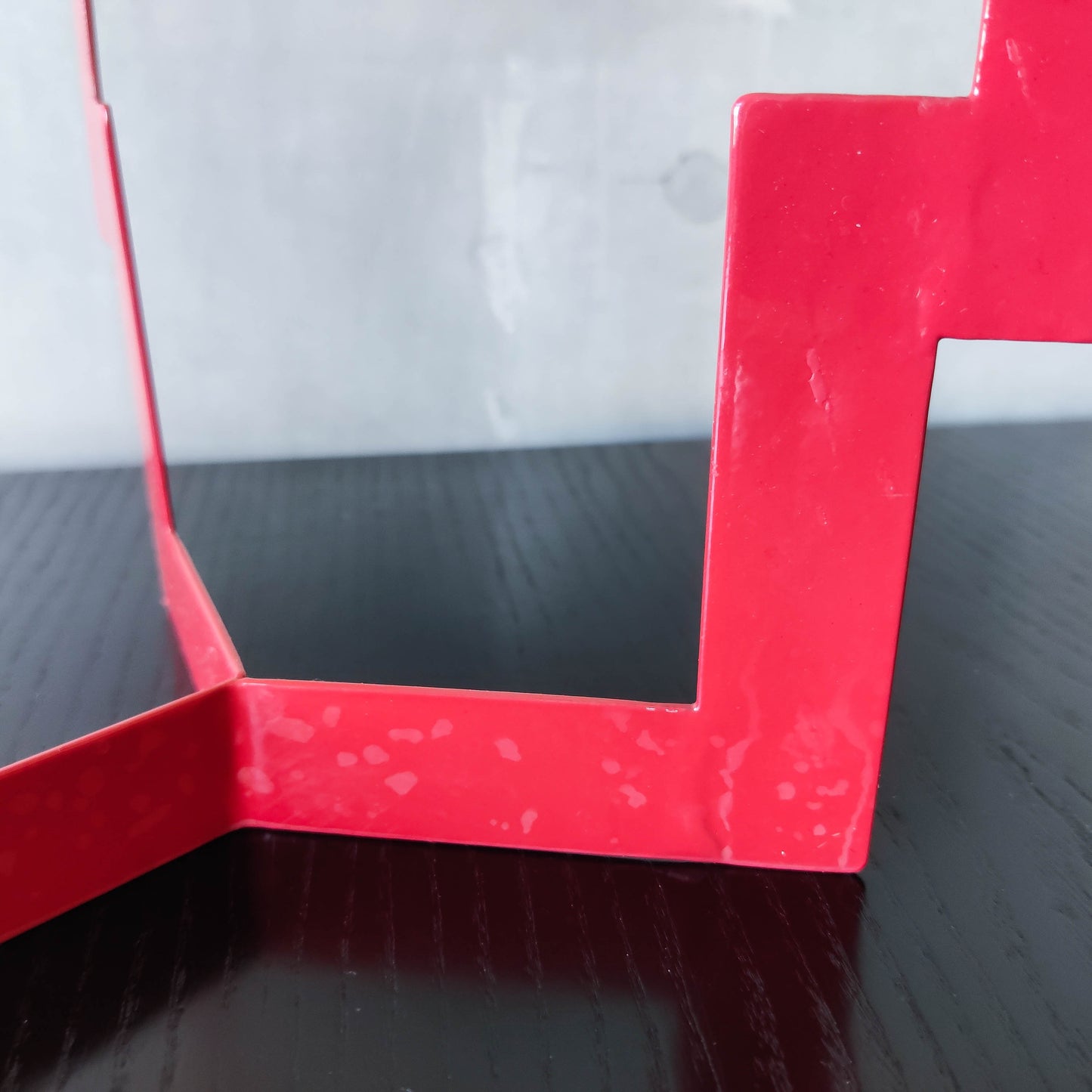 Vintage postmodern style large red steel zigzag candelabra