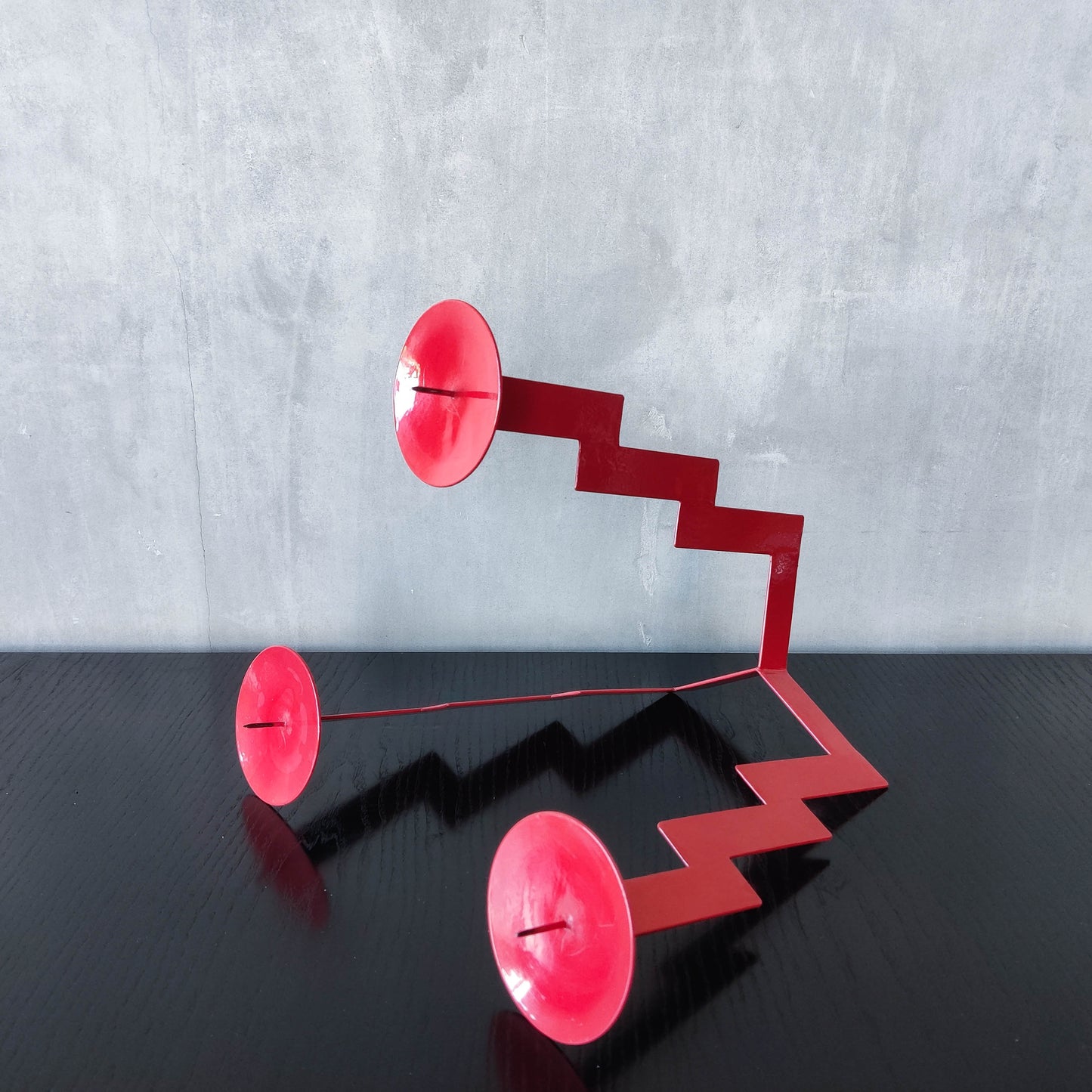 Vintage postmodern style large red steel zigzag candelabra