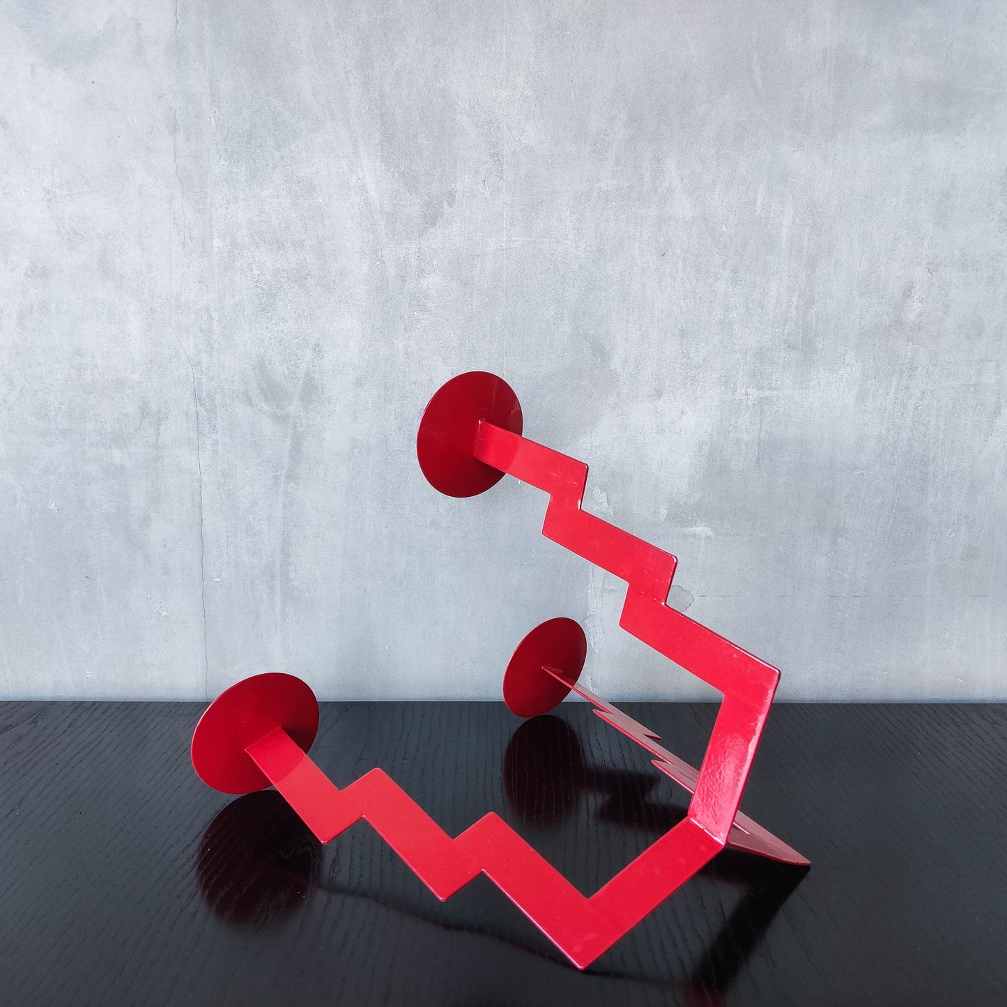 Vintage postmodern style large red steel zigzag candelabra