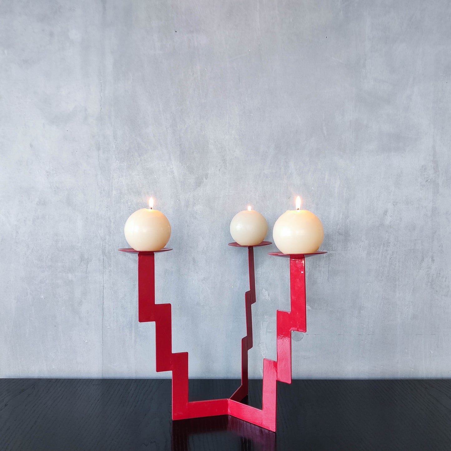 Vintage postmodern style large red steel zigzag candelabra