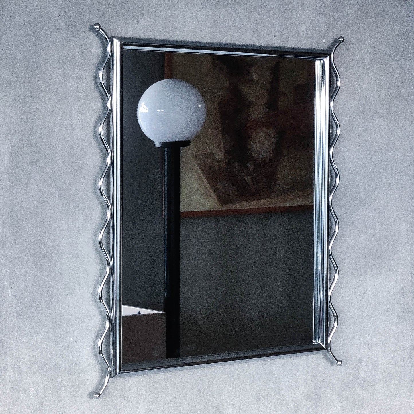 Vintage 1990s postmodern style chrome silver metal mirror with wavy edges