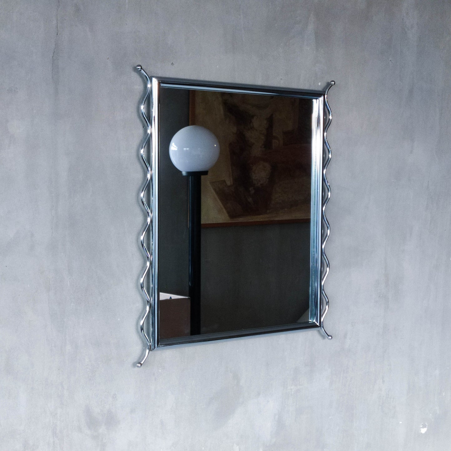 Vintage 1990s postmodern style chrome silver metal mirror with wavy edges