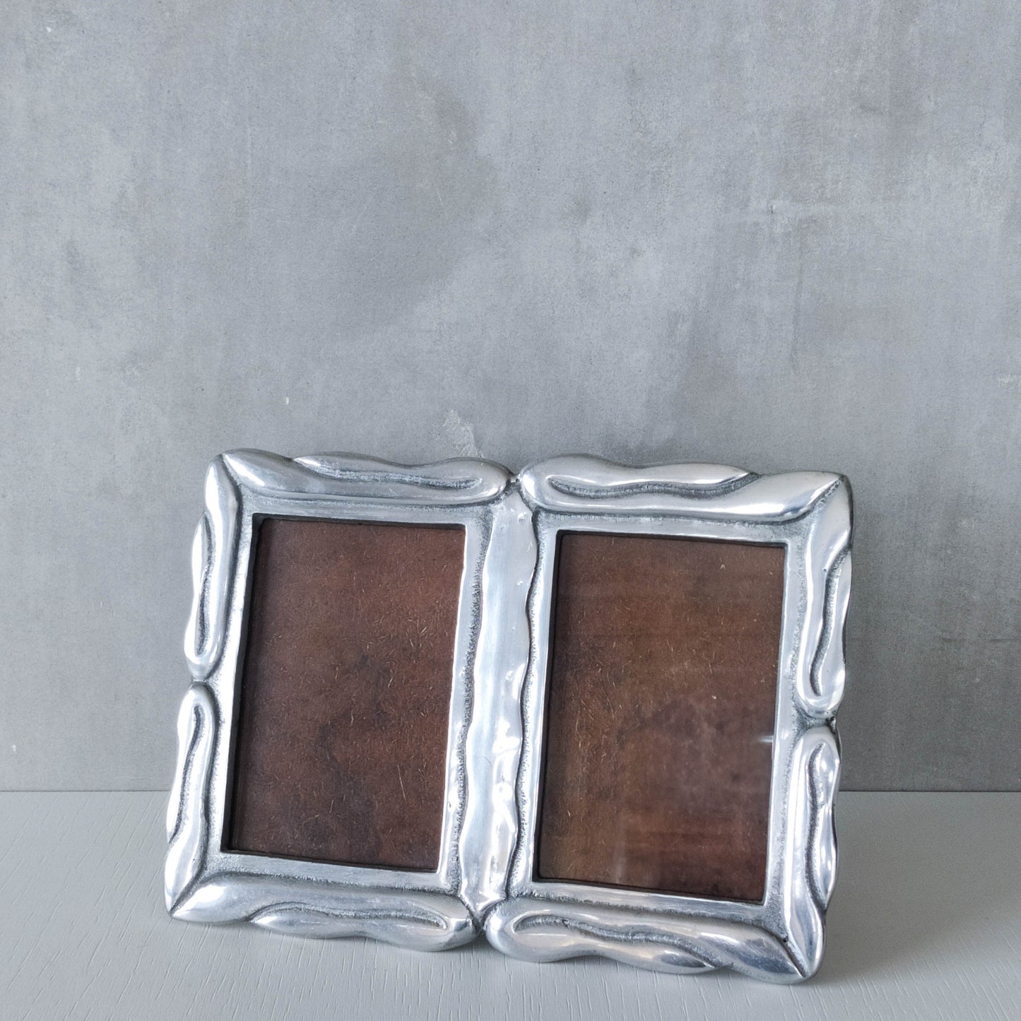 Vintage 1990s cast aluminium organic modernist form double picture photo frame