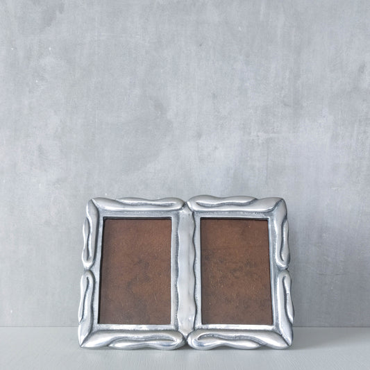 Vintage 1990s cast aluminium organic modernist form double picture photo frame