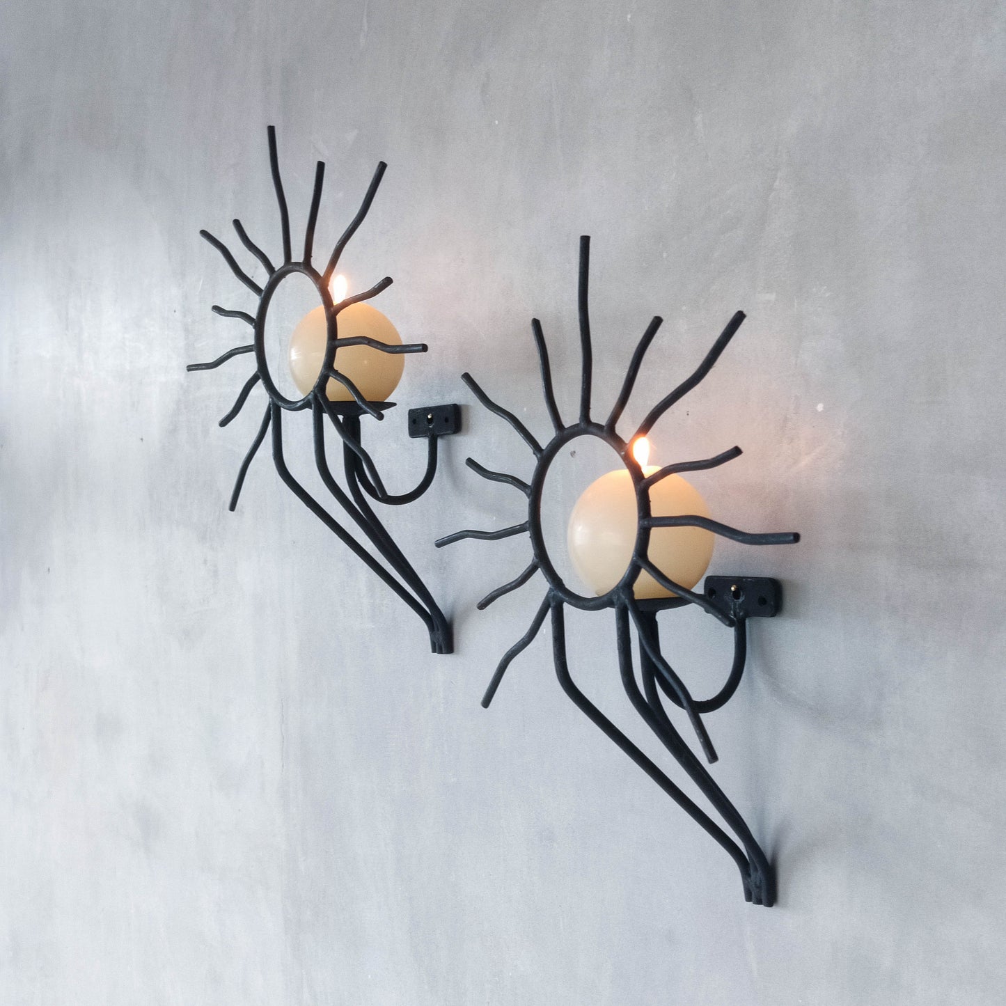 Pair of vintage black welded steel sun candle wall sconces Andre Dubreuil style