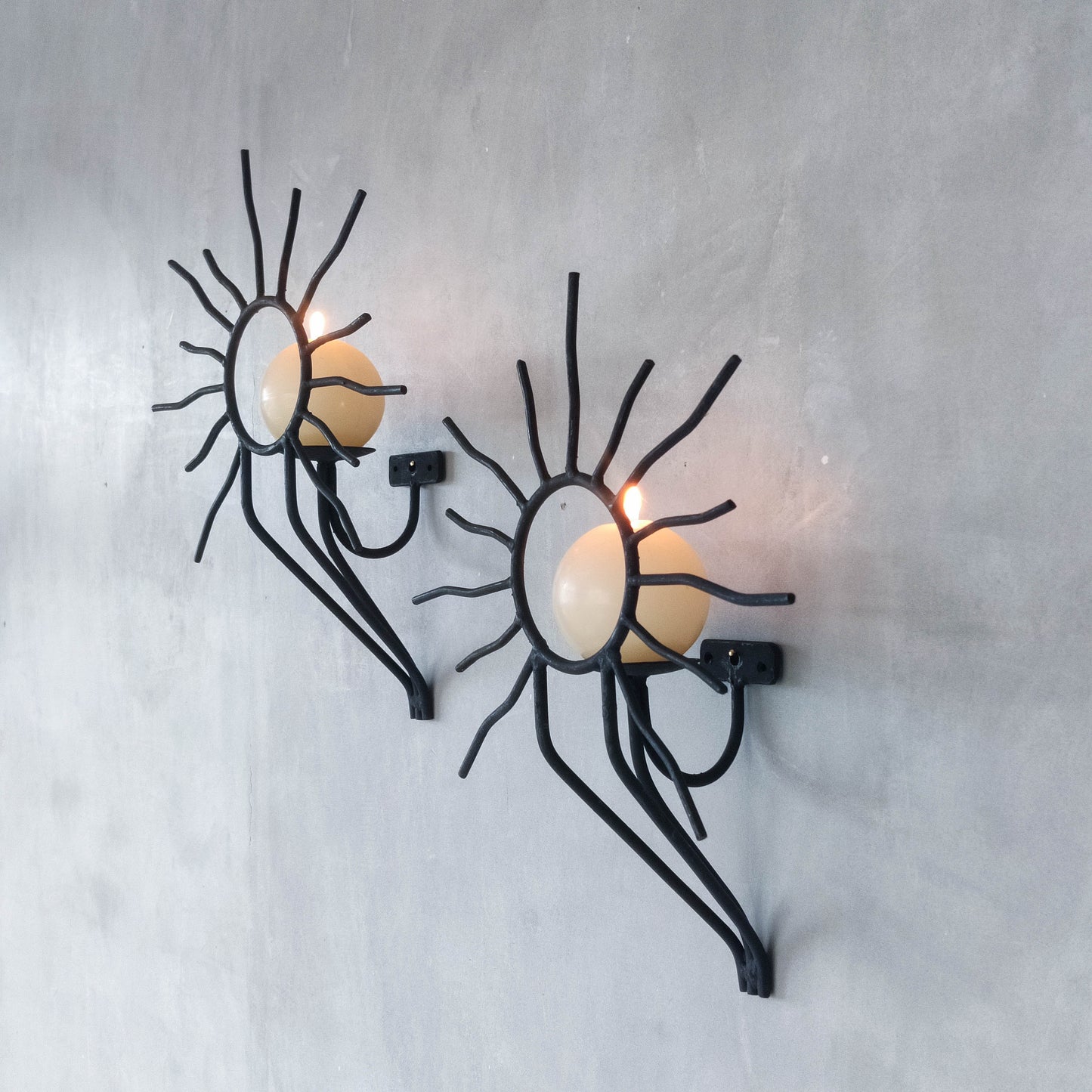 Pair of vintage black welded steel sun candle wall sconces Andre Dubreuil style