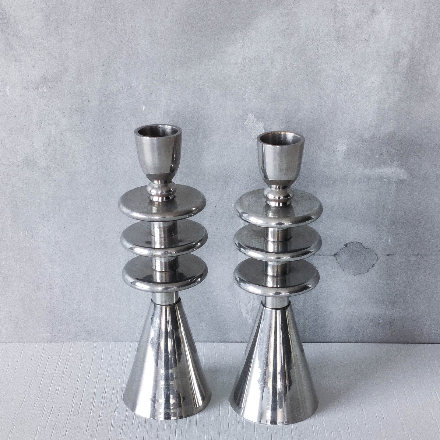 Vintage pair of chrome modernist form sculptural tiered candle holders