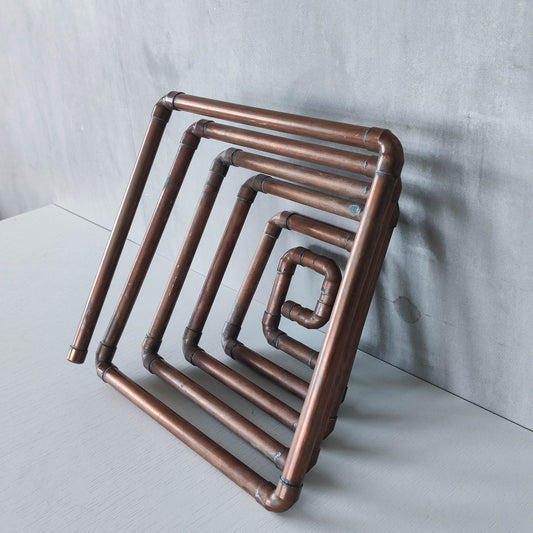 Artisan made sculptural spiral fruit bowl welded patinated copper pipe