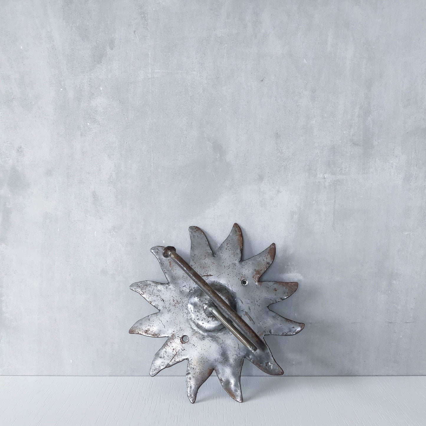 Vintage 1990s handmade artist metalwork steel cut sun toilet roll holder